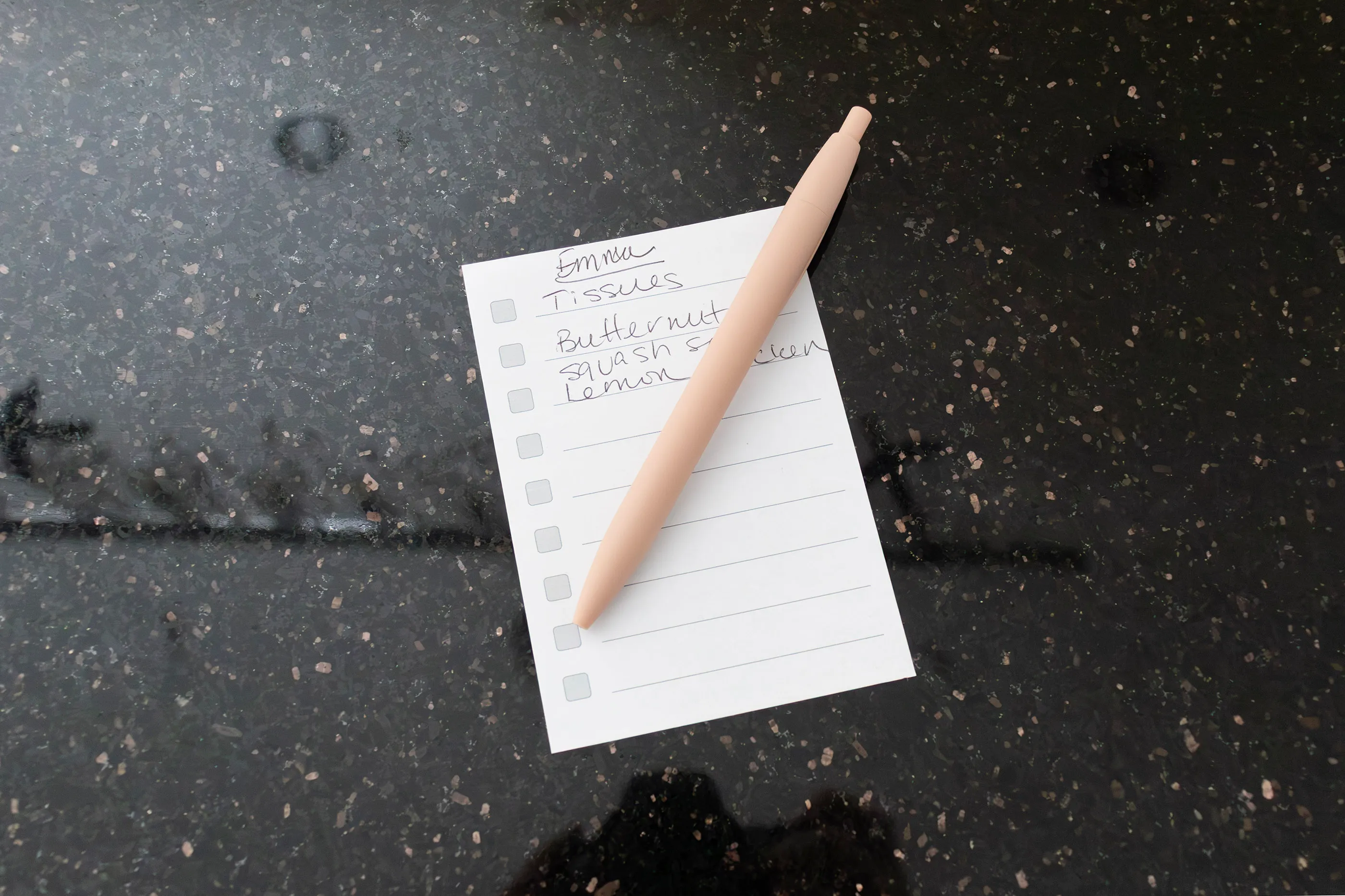 Note and pink pen