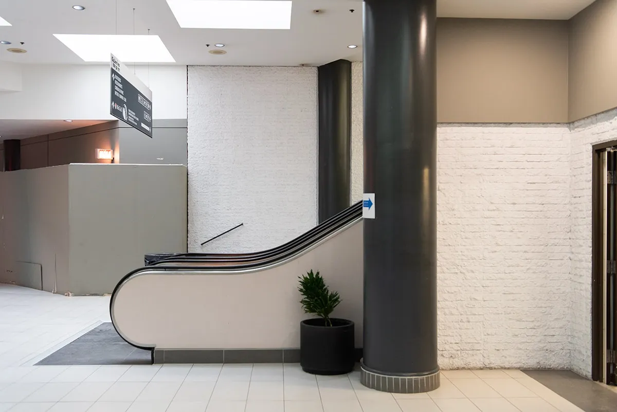 White wall escalator
